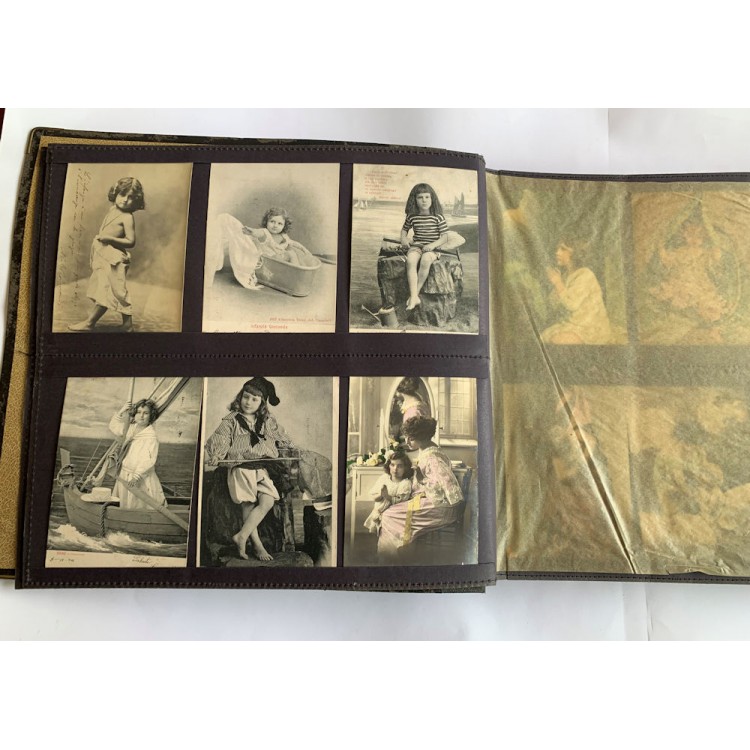 Postcard album with various subjects (women, children, mothers-in-law, lovers)