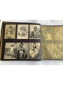 Postcard album with various subjects (women, children, mothers-in-law, lovers)