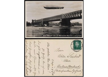 POSTCARD Zeppelin airship flying over the Mannheim Bridge (1930)