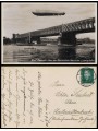 POSTCARD Zeppelin airship flying over the Mannheim Bridge (1930)